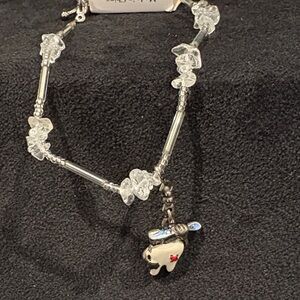 Silver Charm Anke Bracelet with tooth-Heart Pendant